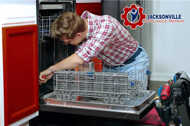 The technician is repairing the dishwasher